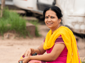 portrait-of-indian-woman-against-view-of-jodhpur